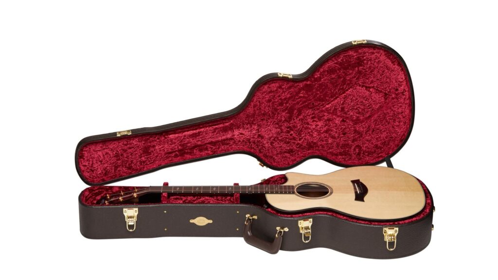Image of Taylor hardshell guitar case containing Taylor acoustic guitar