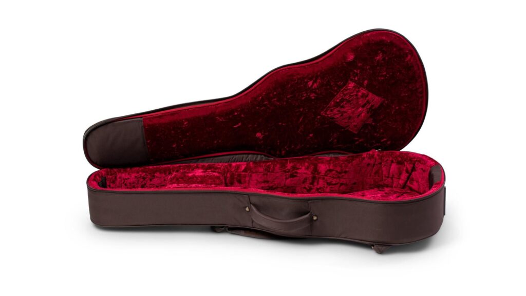Image of a Taylor AeroCase for acoustic guitars featuring a red interior plush lining