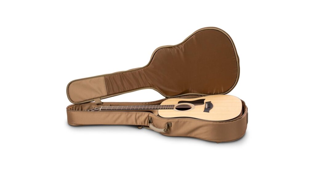Image of Taylor structured gig bag for acoustic guitars containing a Taylor acoustic guitar