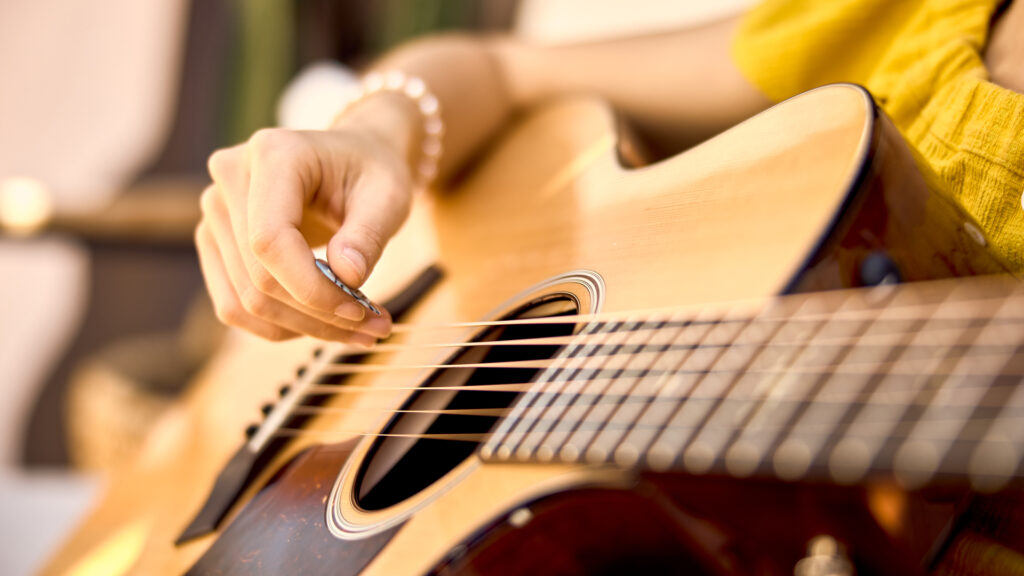 How To Hold A Guitar Pick Taylor Guitars