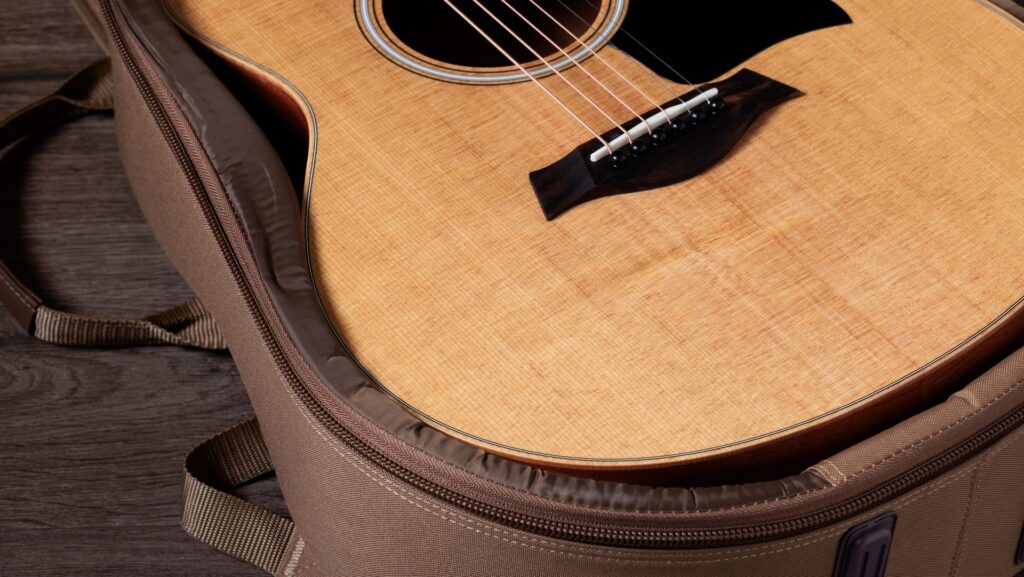 Close-up image of the front of a Taylor GS Mini Sapele acoustic guitar, a great gift for guitar players