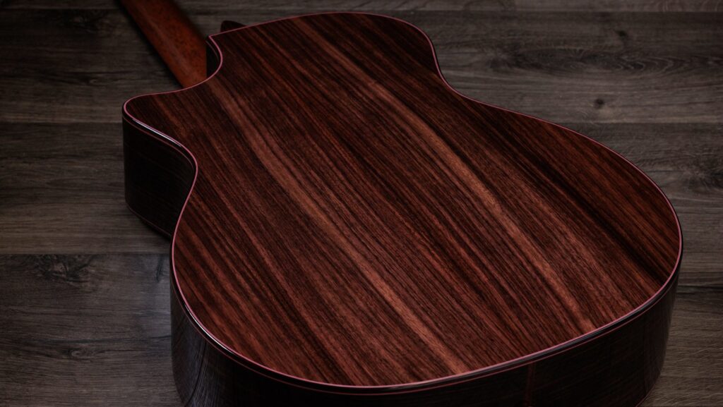 Indian rosewood back of a Taylor Legacy 914ce acoustic-electric guitar showing wood grain and variegation